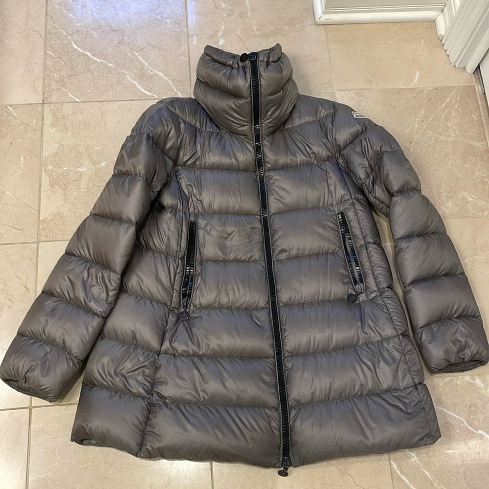Moncler thigh leng winter coat.